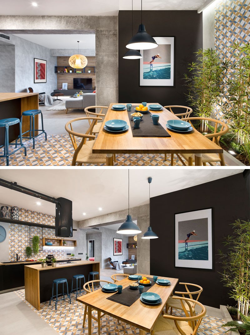 В этой перепроектированной испанской квартире сочетаются бетон, дерево, плитка и черные акценты