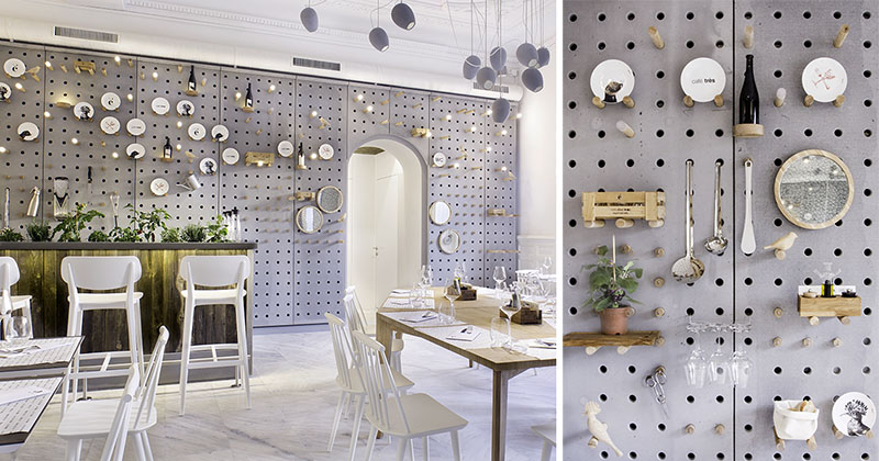 Бетонные перфорированые плиты на стенах этого кафе создают уникальное пространство для стеллажей